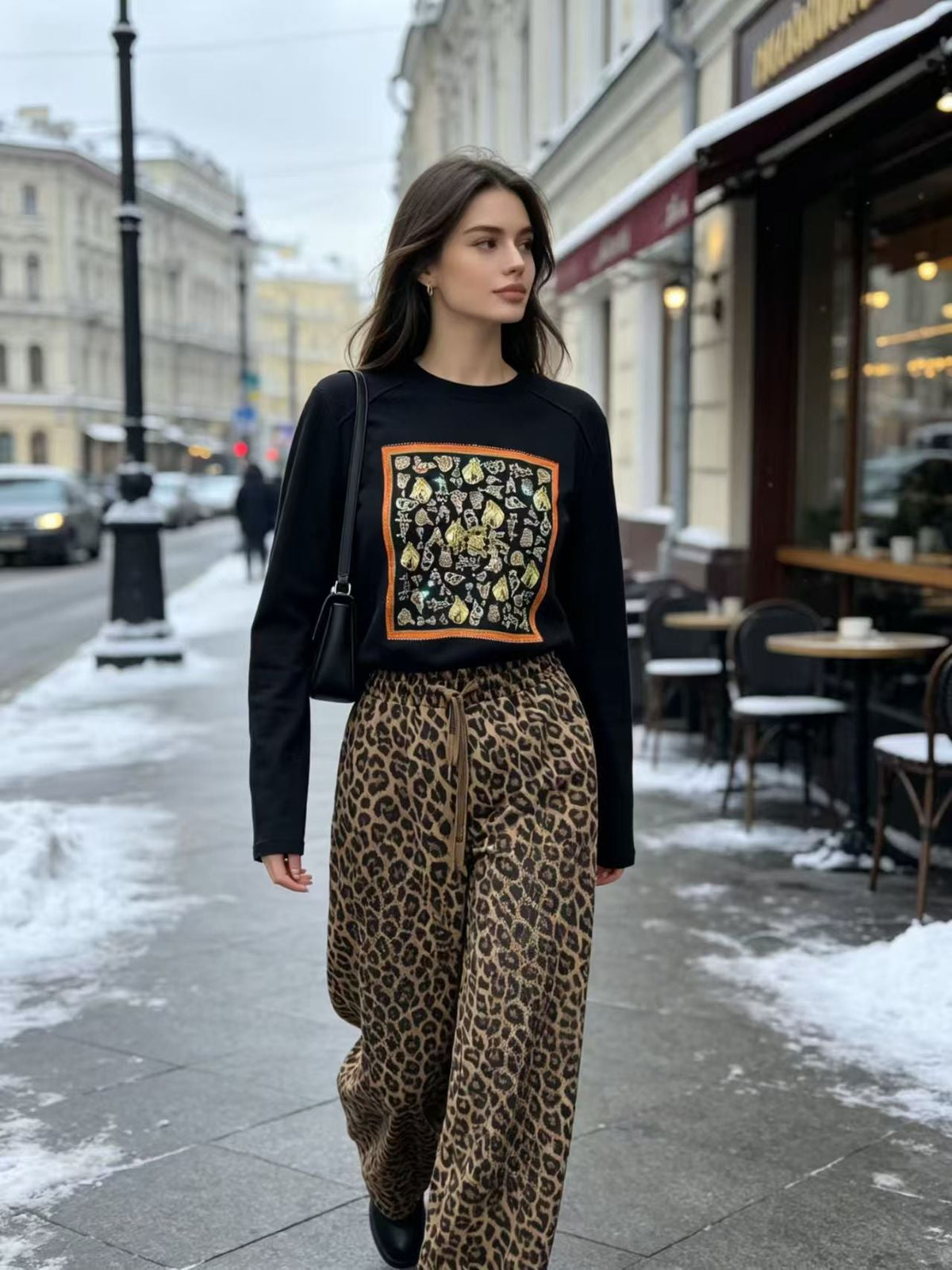 Editorial Street Shot of Equestrian Scarf Top & Leopard Wide Leg Pants